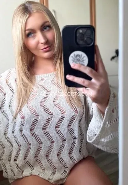 Mackay escorts Britt — 3