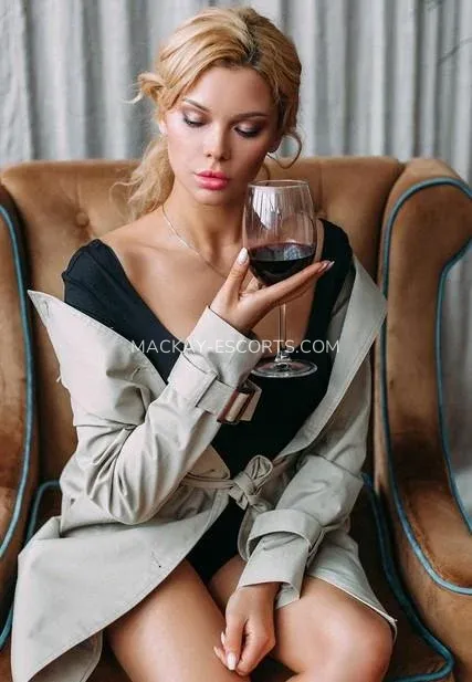Mackay escorts Elin — 1