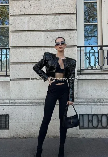 Mackay escorts Paige — 1