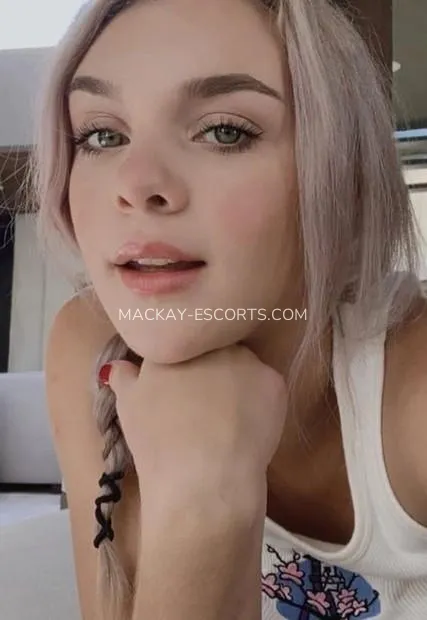 Mackay escorts Milagros — 2