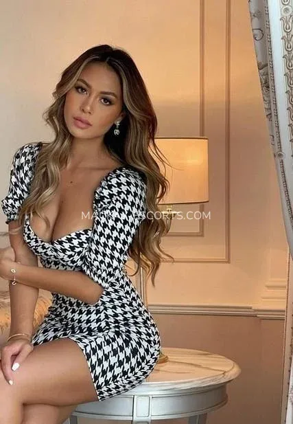 Mackay escorts Tiffany — 1