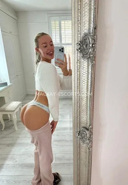 Mackay escorts Elin — 6