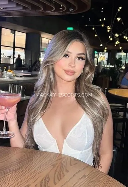 Mackay escorts Camilla — 2