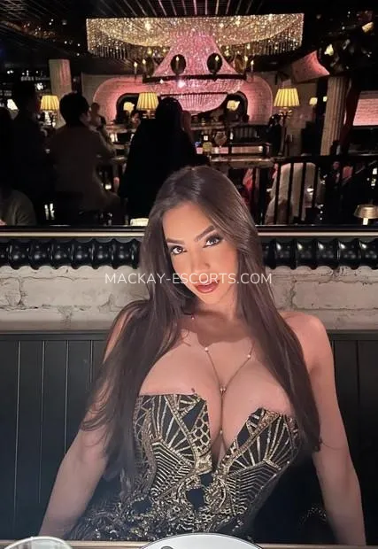 Mackay escorts Caitlin — 2